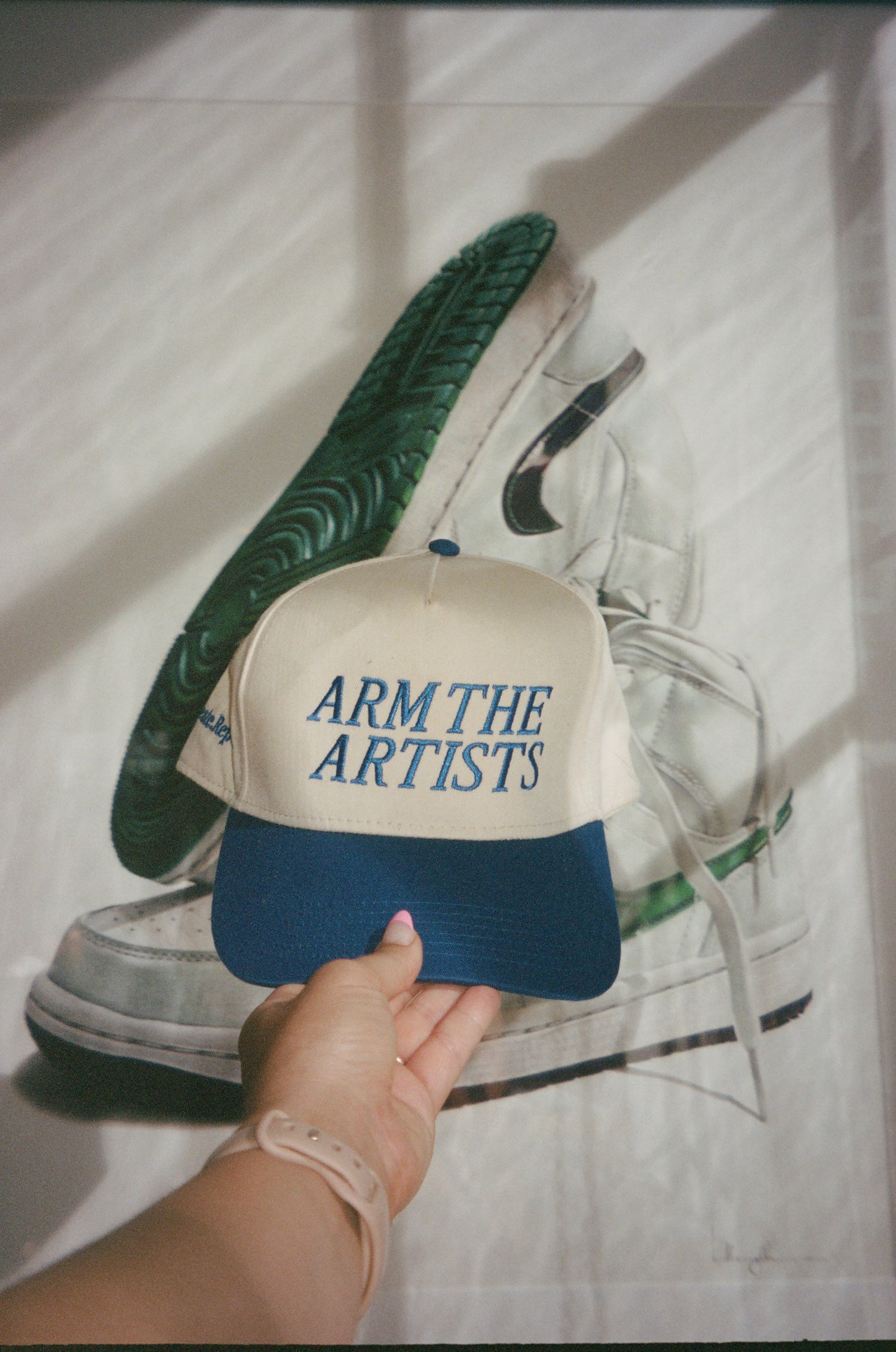 ARM THE ARTISTS HAT